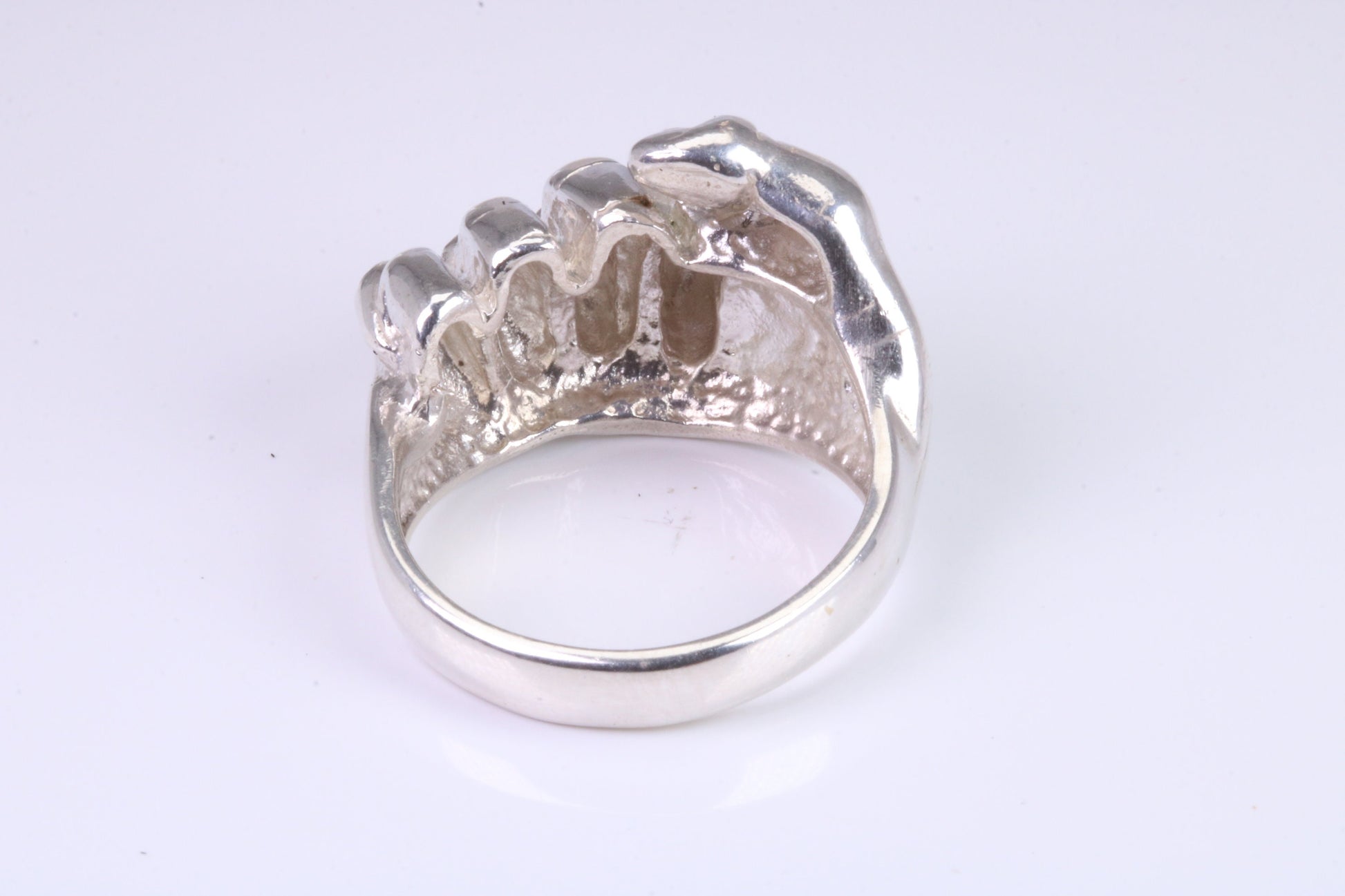 Very large and very heavy fist ring set with diamond white top grade cubic zirconia's, made from solid cast Silver , British Hallmarked