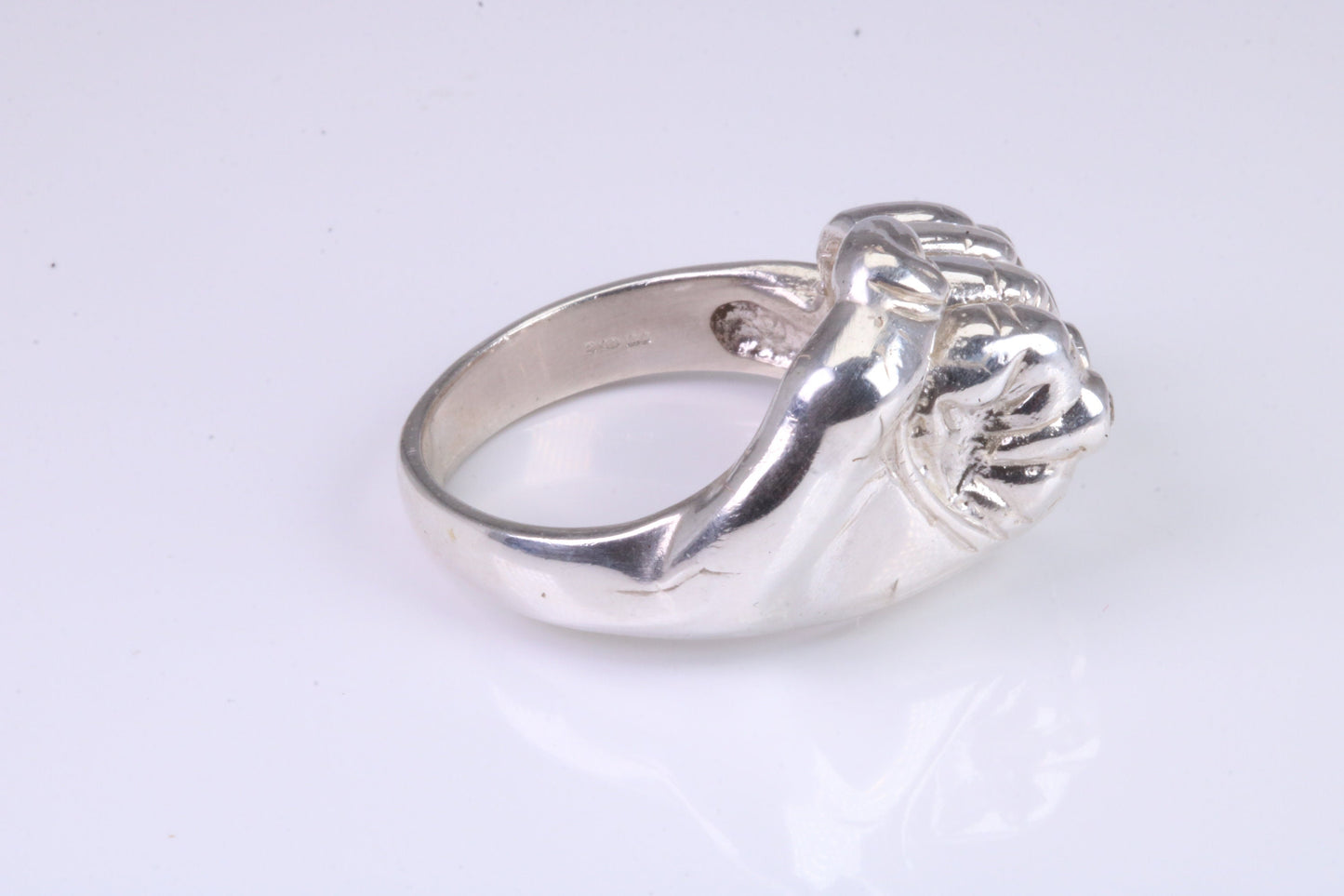 Very large and very heavy fist ring set with diamond white top grade cubic zirconia's, made from solid cast Silver , British Hallmarked