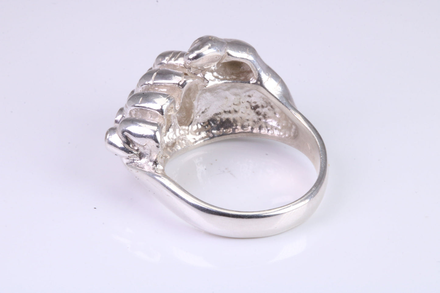 Very large and very heavy fist ring set with diamond white top grade cubic zirconia's, made from solid cast Silver , British Hallmarked