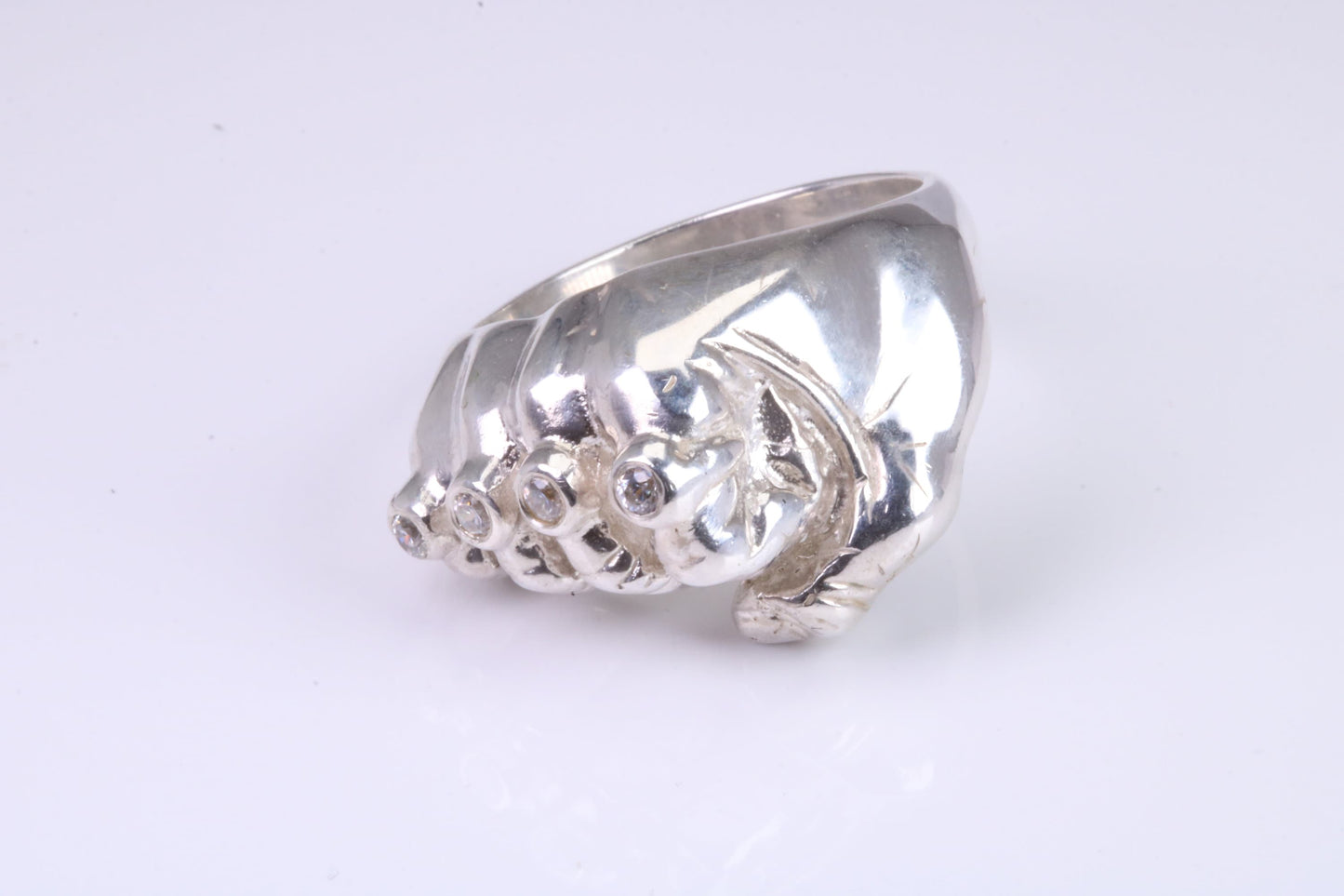 Very large and very heavy fist ring set with diamond white top grade cubic zirconia's, made from solid cast Silver , British Hallmarked