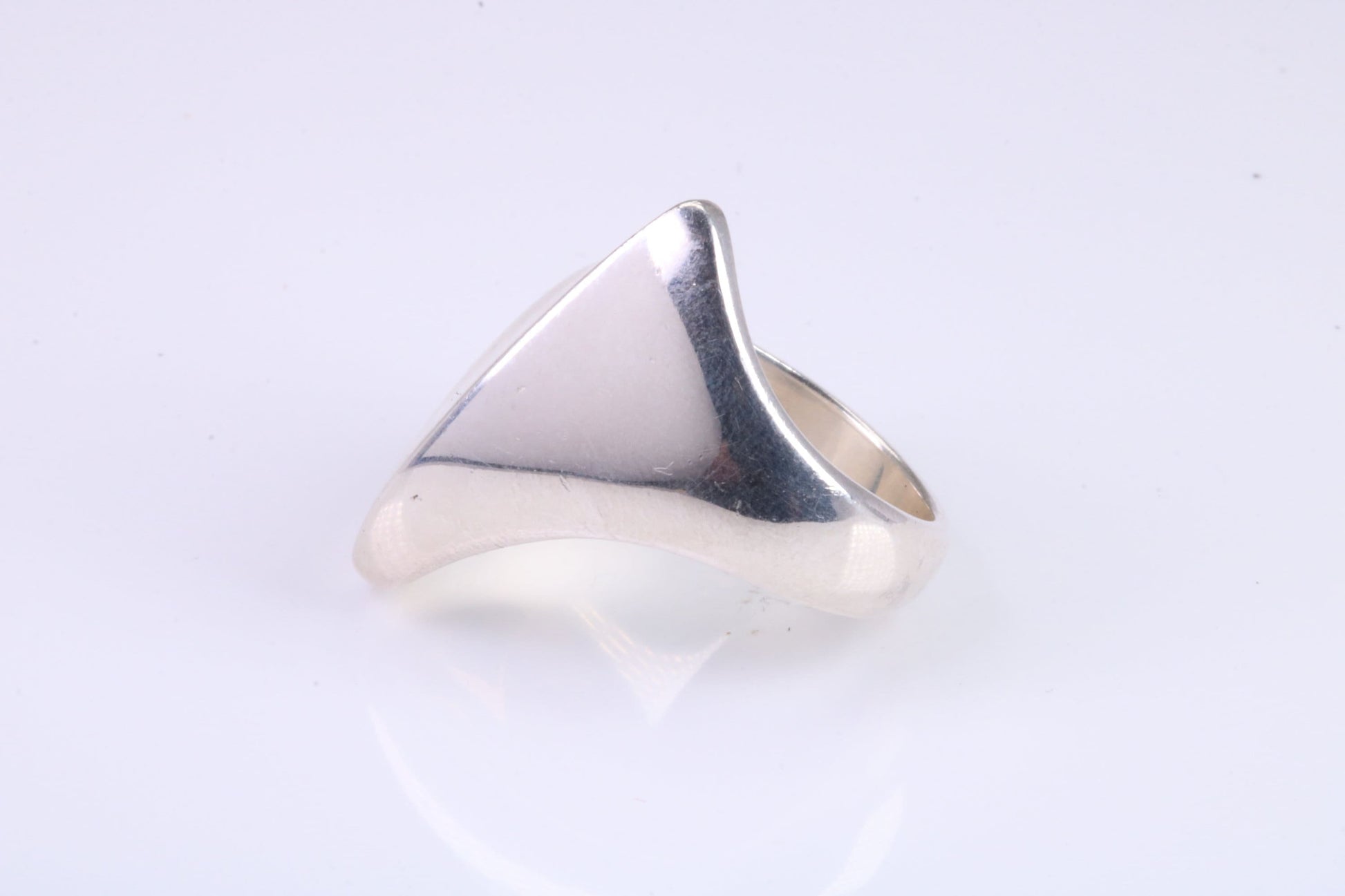 Large Abstract ring, made from solid cast sterling silver, very smooth and fluid lines with high polished finish