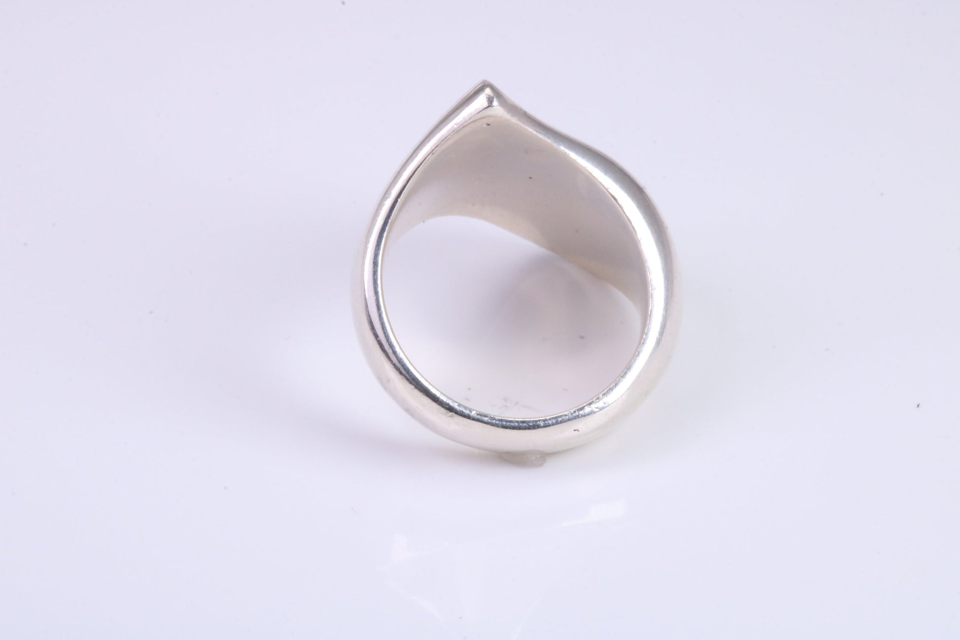 Large Abstract ring, made from solid cast sterling silver, very smooth and fluid lines with high polished finish