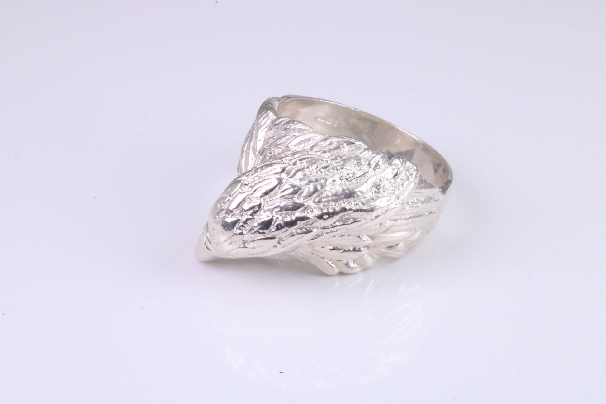 Large and heavy American Eagle Head ring, made from solid cast silver, British Hallmarked