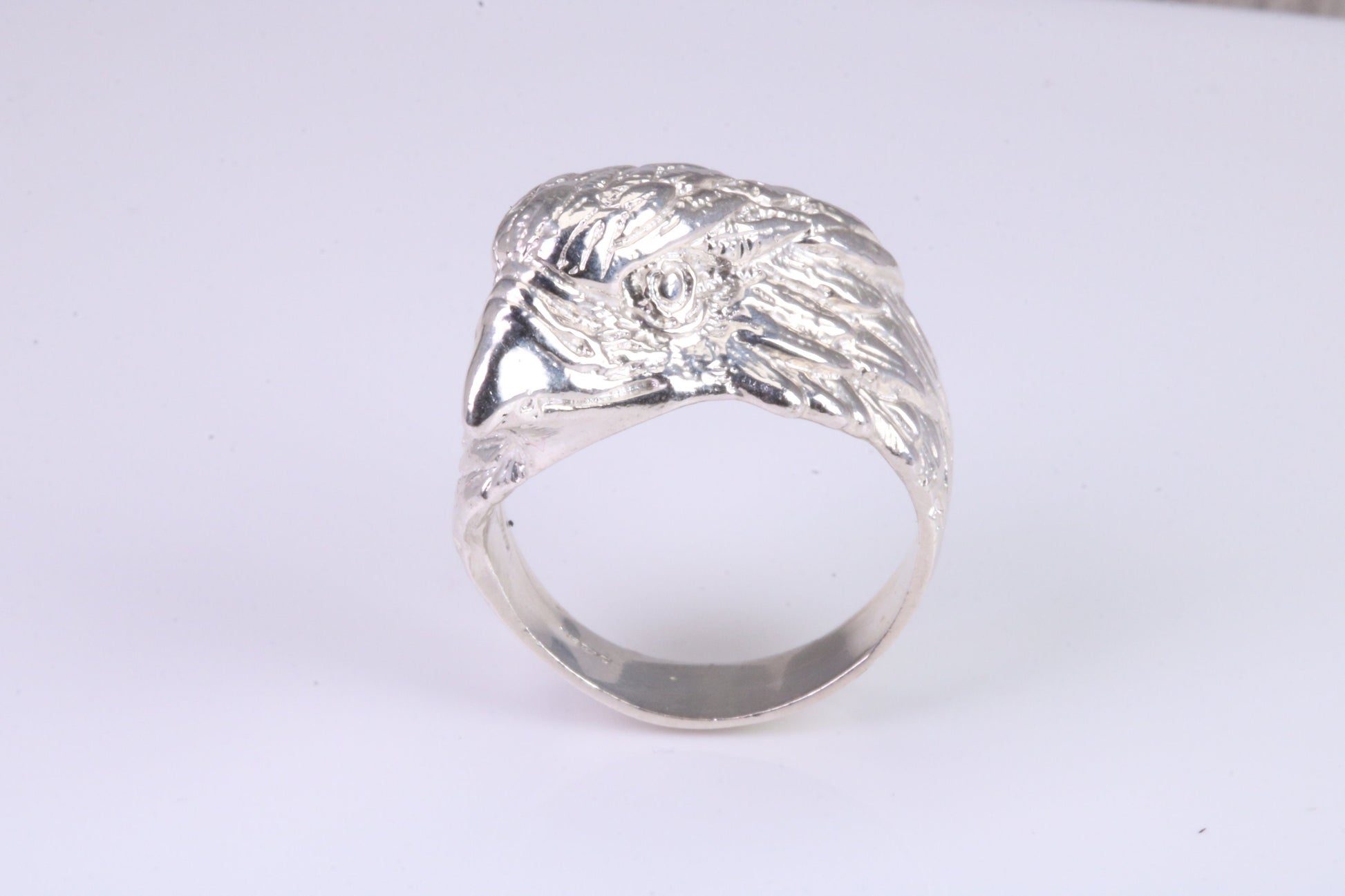 Large and heavy American Eagle head ring,solid silver, perfect for all age groups. Available in silver, yellow gold, white gold and platinum