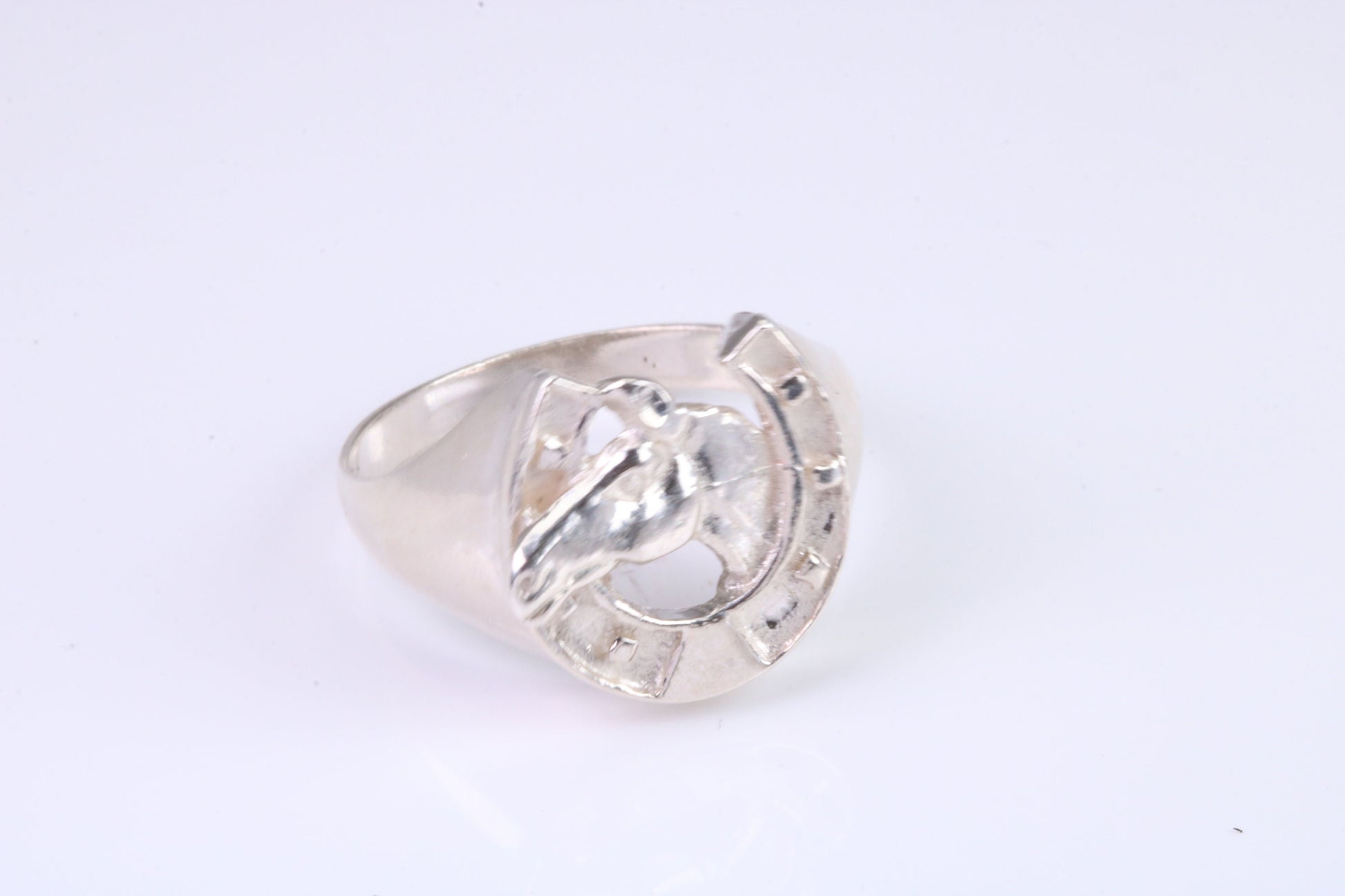 Horse Shoe ring, made from solid cast silver with high polished finish