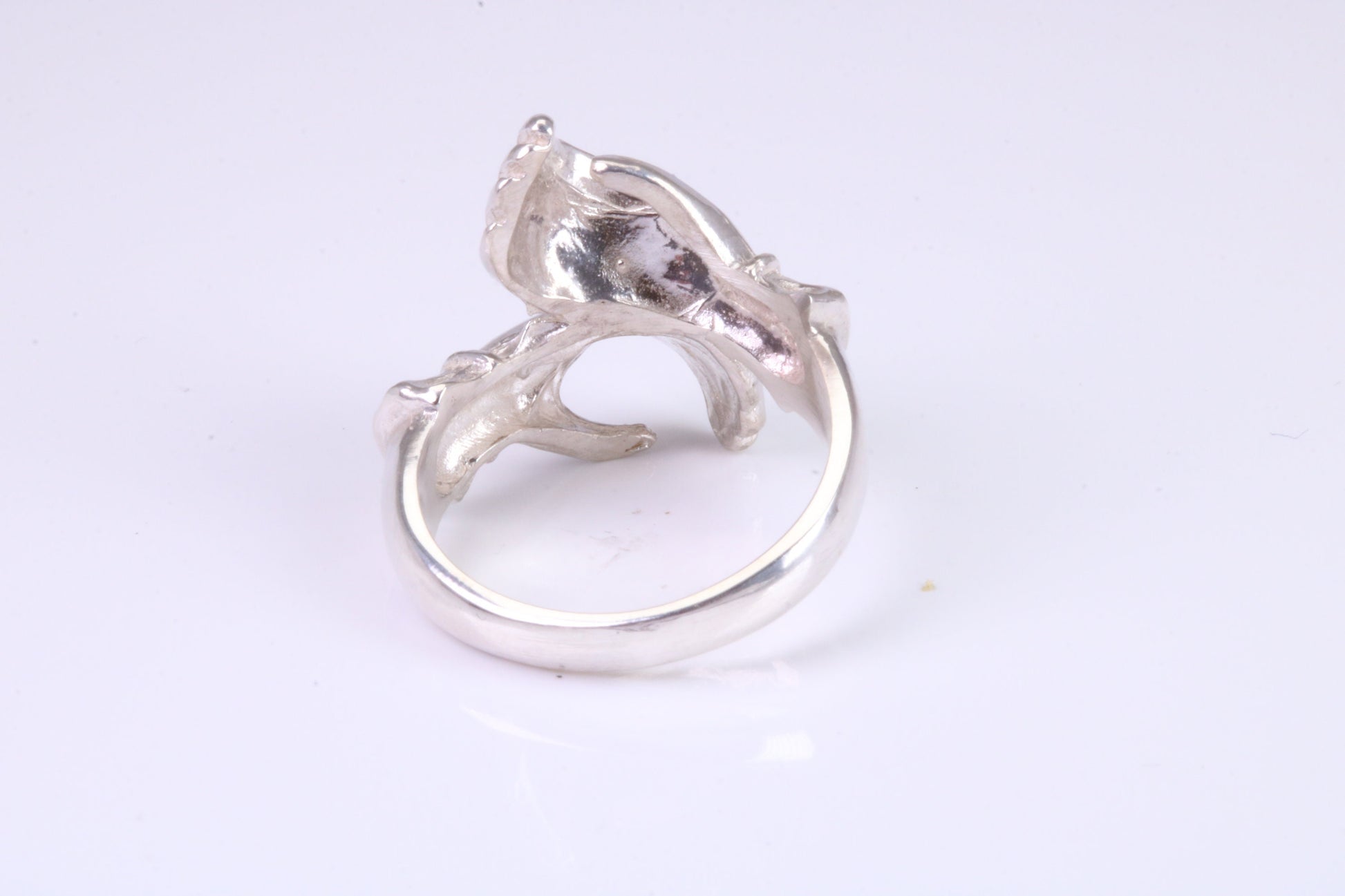 Two hands Ring, made from solid cast silver with high polished finish