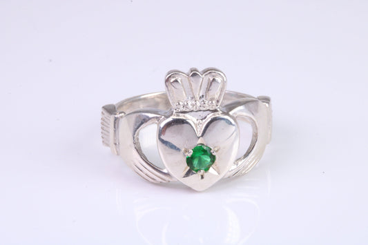 Large and heavy stone set Claddagh ring, set with Emerald Green C Z, solid cast silver