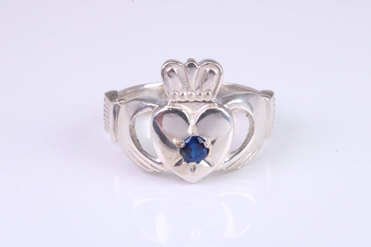 Large and heavy stone set Claddagh ring, set with Sapphire Blue C Z, solid cast silver