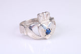 Large and heavy stone set Claddagh ring, set with Sapphire Blue C Z, solid cast silver