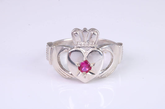 Large and heavy stone set Claddagh ring, set with Ruby Red C Z, solid cast silver