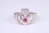 Large and heavy stone set Claddagh ring, set with Ruby Red C Z, solid cast silver
