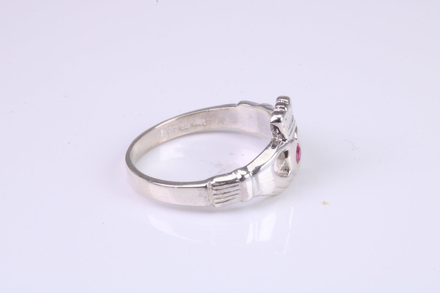 Dainty Ruby Red C Z set Claddagh ring, set with Ruby Red C Z, solid cast silver