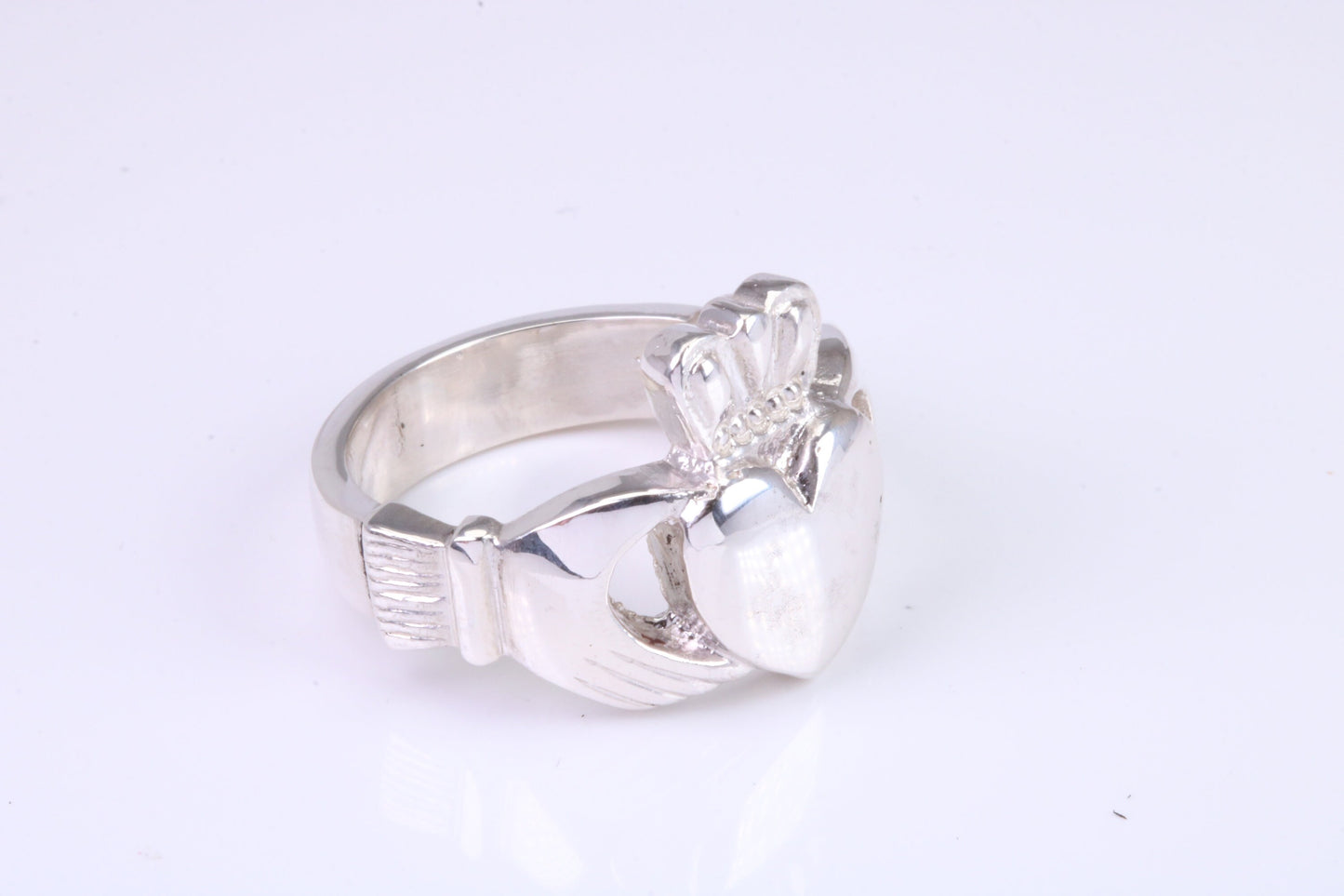 Large and heavy Claddagh ring, made from solid cast silver, British hallmarked