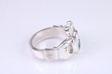 Large and heavy Sapphire Blue C Z set Claddagh ring, made from solid cast silver, British hallmarked