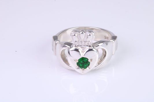 Large and heavy Emerald Green C Z set Claddagh ring, made from solid cast silver, British hallmarked