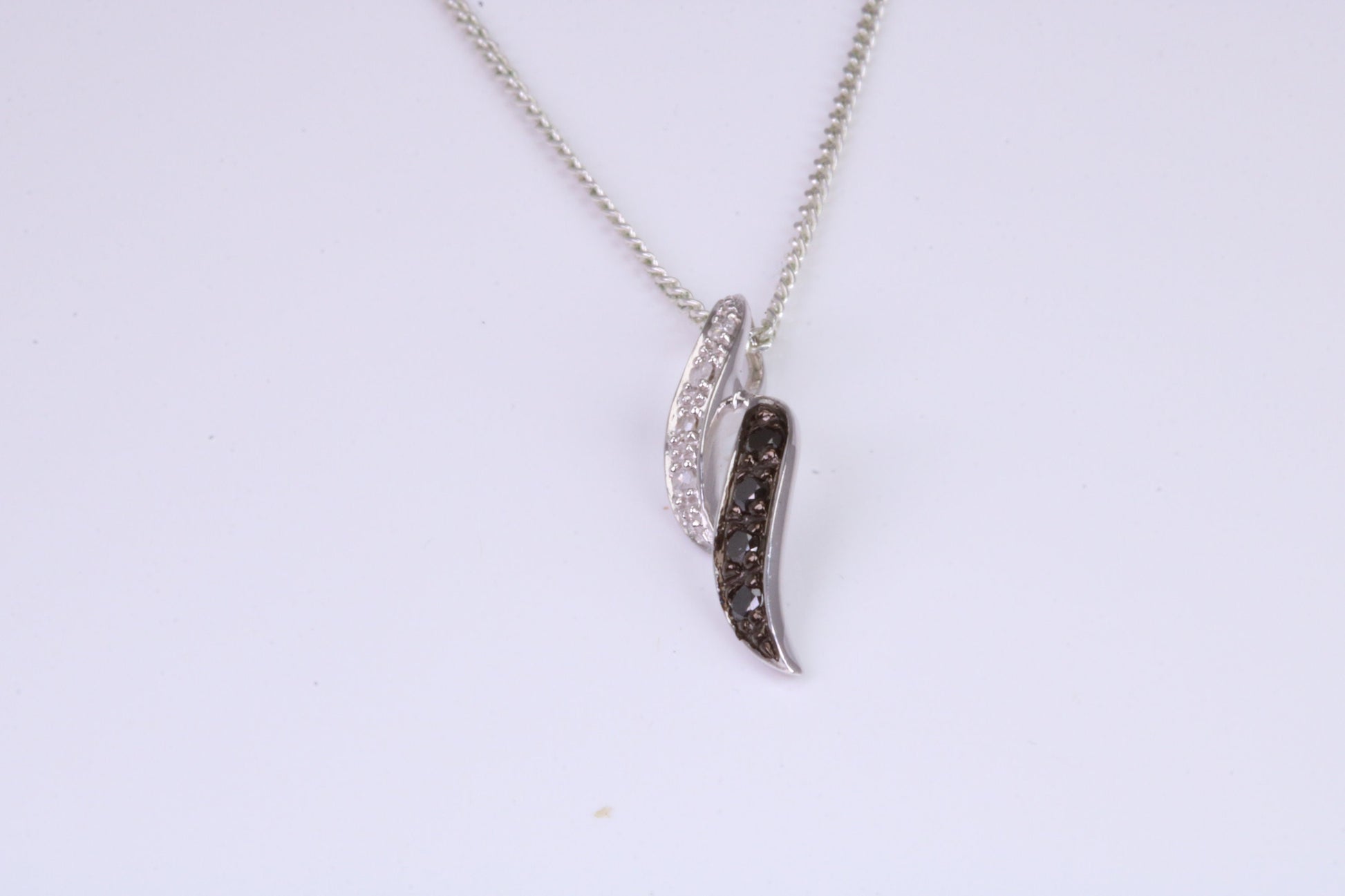 Black and White Natural Diamonds set solid White Gold Pendant with 18 inch long Chain