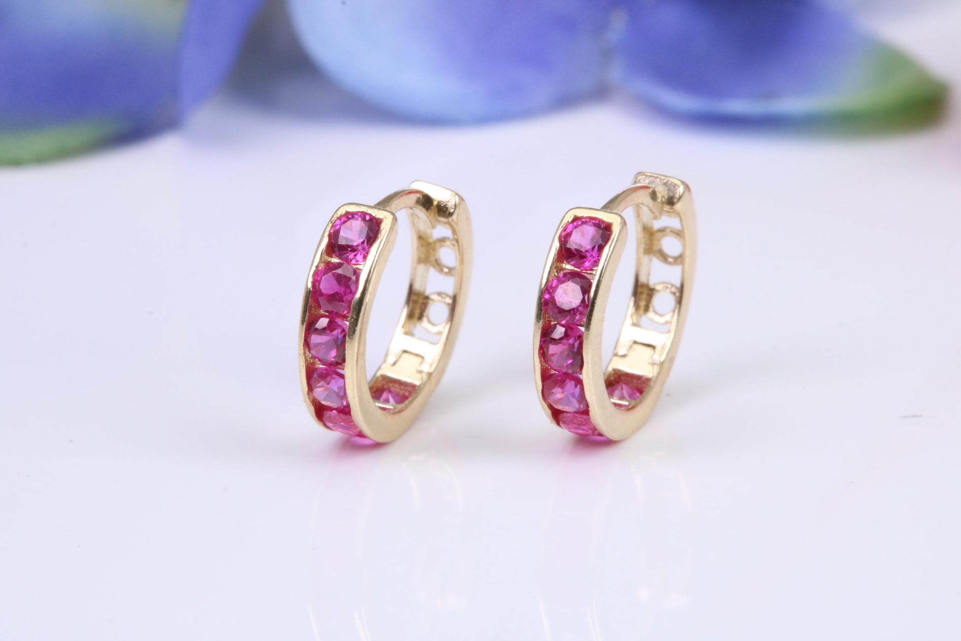 10 mm round hinged hoop earrings, made from solid yellow gold and set with Ruby Red Cubic Zirconia