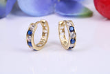 10 mm round hinged hoop earrings, made from solid yellow gold and set with Sapphire and Diamond Cubic Zirconia