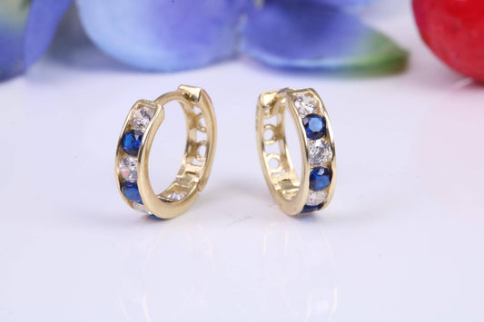 10 mm round hinged hoop earrings, made from solid yellow gold and set with Sapphire and Diamond Cubic Zirconia