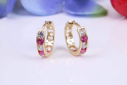 10 mm round hinged hoop earrings, made from solid yellow gold and set with Ruby and Diamond Cubic Zirconia
