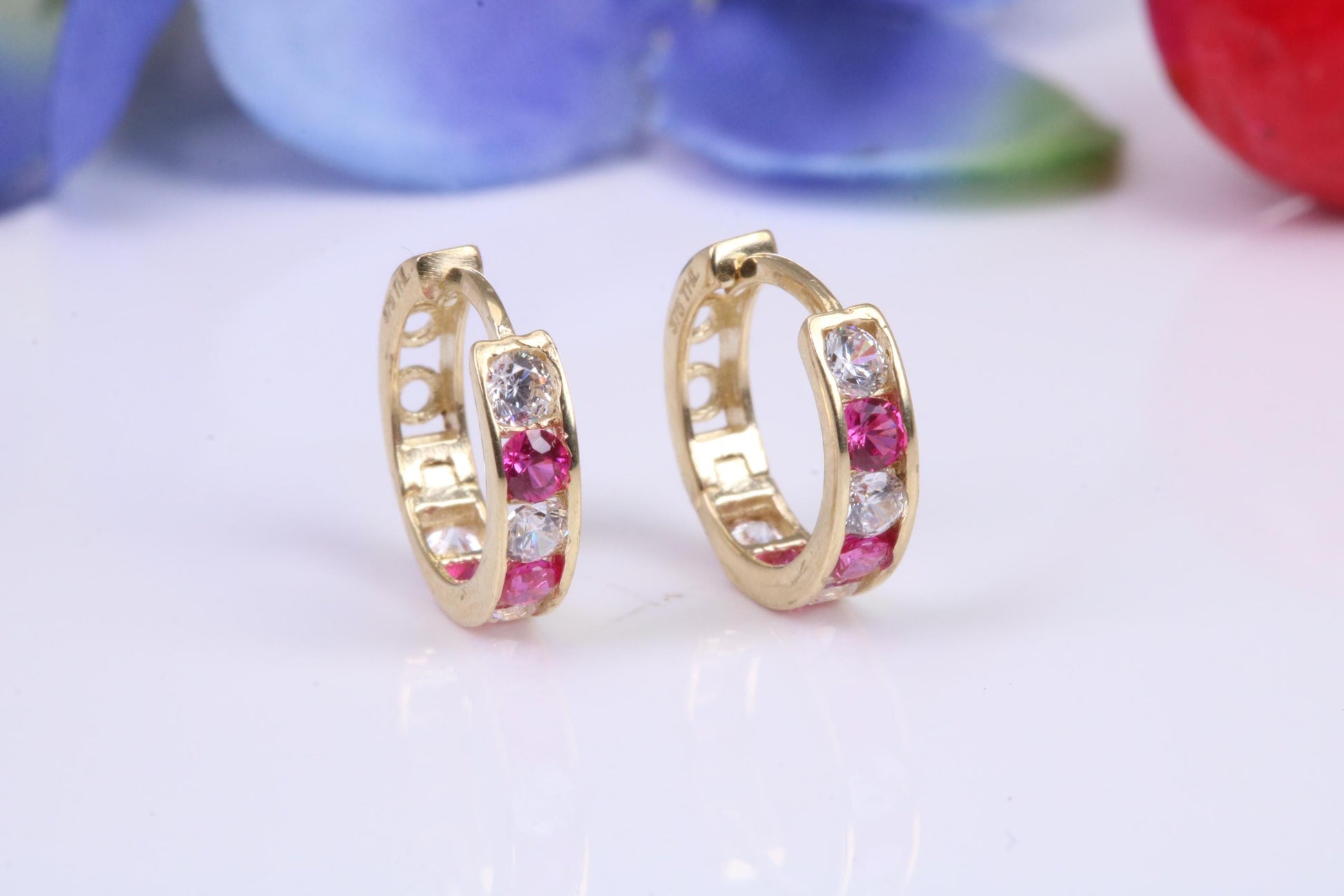 10 mm round hinged hoop earrings, made from solid yellow gold and set with Ruby and Diamond Cubic Zirconia