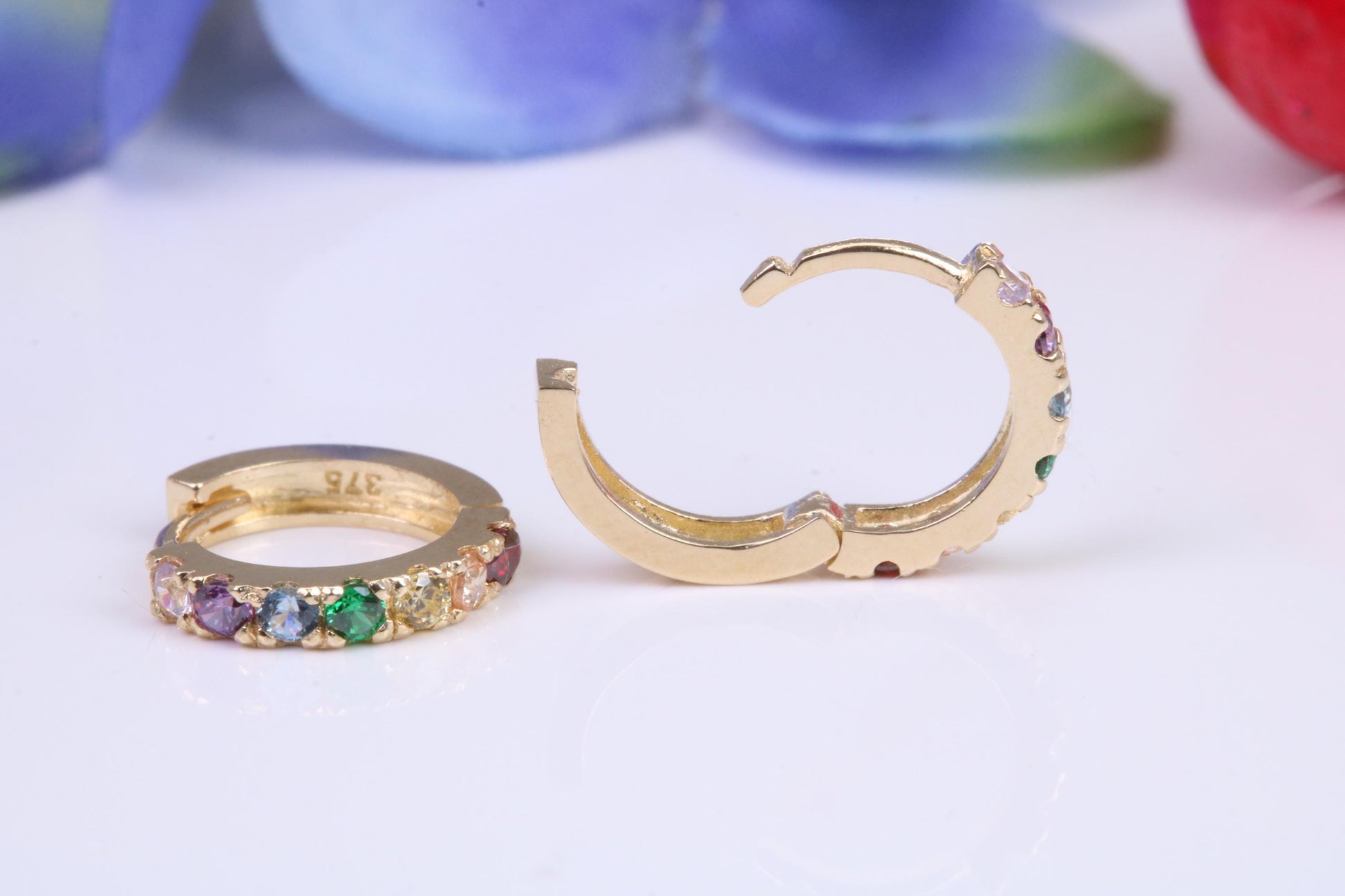 10 mm round hinged hoop earrings, made from solid yellow gold and set with Rainbow Coloured Cubic Zirconia