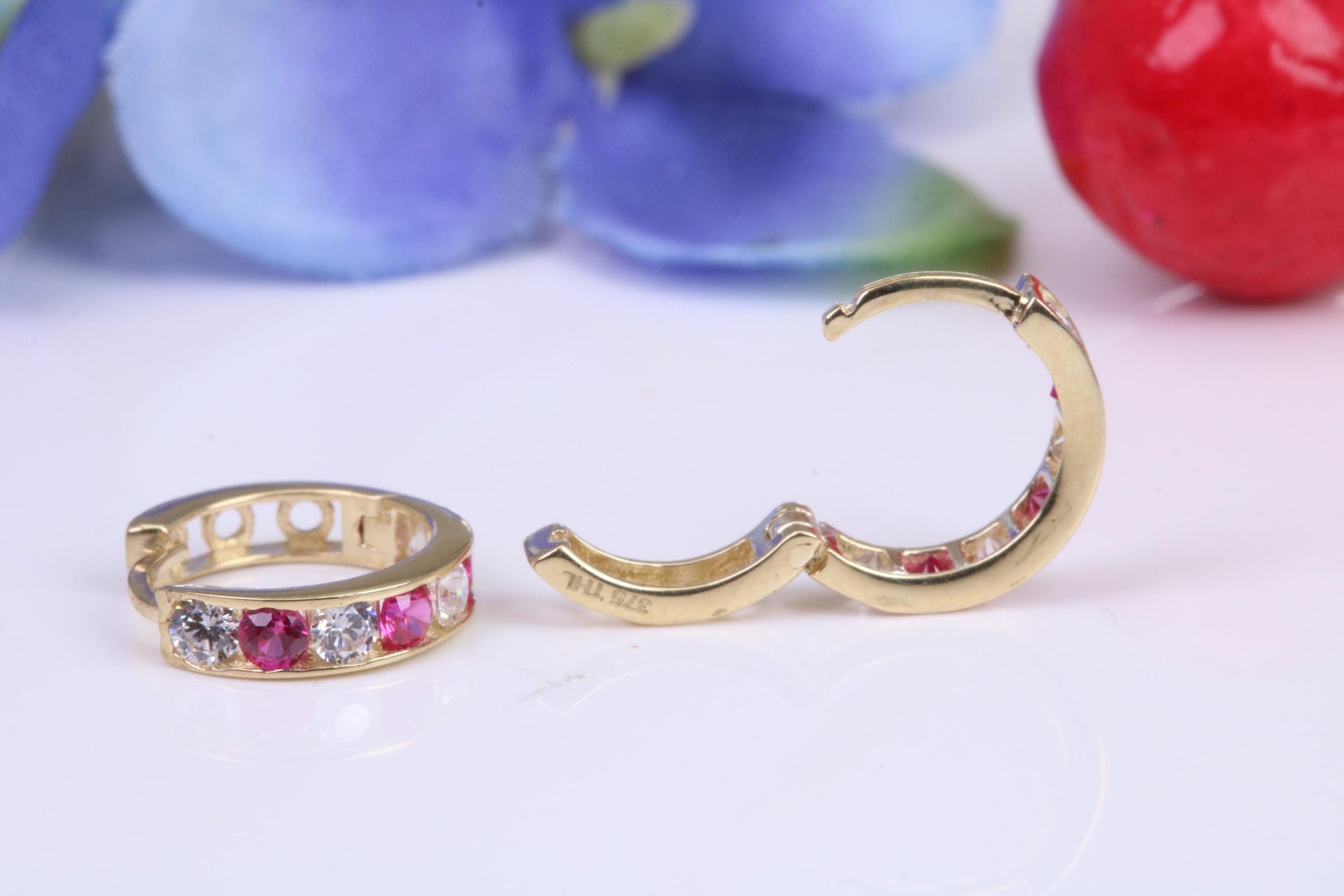 10 mm round hinged hoop earrings, made from solid yellow gold and set with Ruby and Diamond Cubic Zirconia