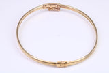Hinged 3 mm wide yellow gold oval Bangle, British hallmarked