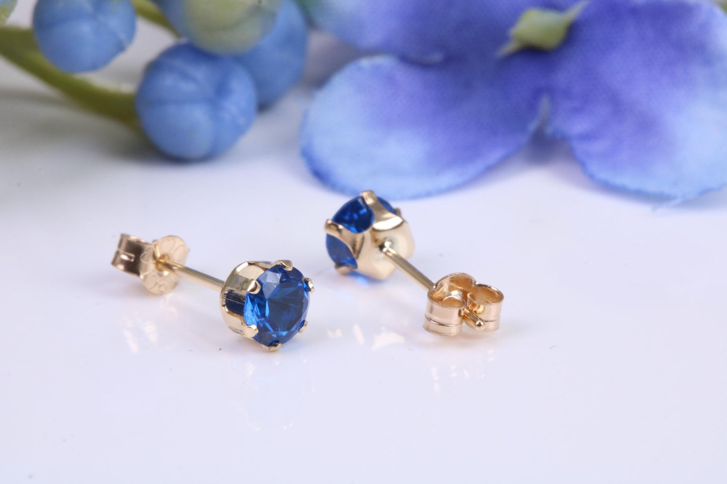 Small 4 mm Round Sapphire Blue Cubic Zirconia set Stud Earrings, Made from Solid 9ct Yellow Gold