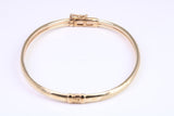 Hinged 4 mm wide yellow gold oval Bangle, British hallmarked