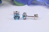 5 mm Round Blue Topaz Cubic Zirconia set Stud Earrings, Made from Solid Cast Sterling Silver