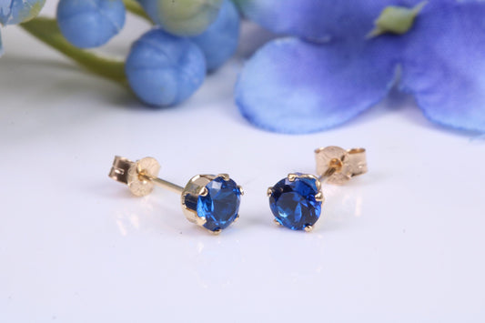 Small 4 mm Round Sapphire Blue Cubic Zirconia set Stud Earrings, Made from Solid 9ct Yellow Gold