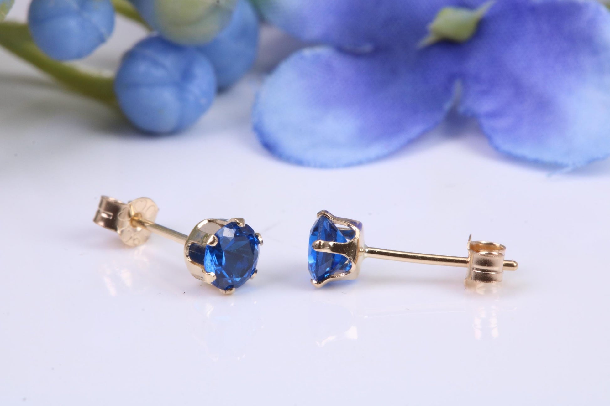 Small 4 mm Round Sapphire Blue Cubic Zirconia set Stud Earrings, Made from Solid 9ct Yellow Gold