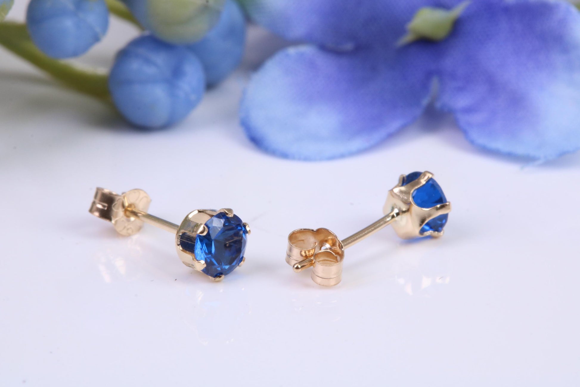 Small 4 mm Round Sapphire Blue Cubic Zirconia set Stud Earrings, Made from Solid 9ct Yellow Gold