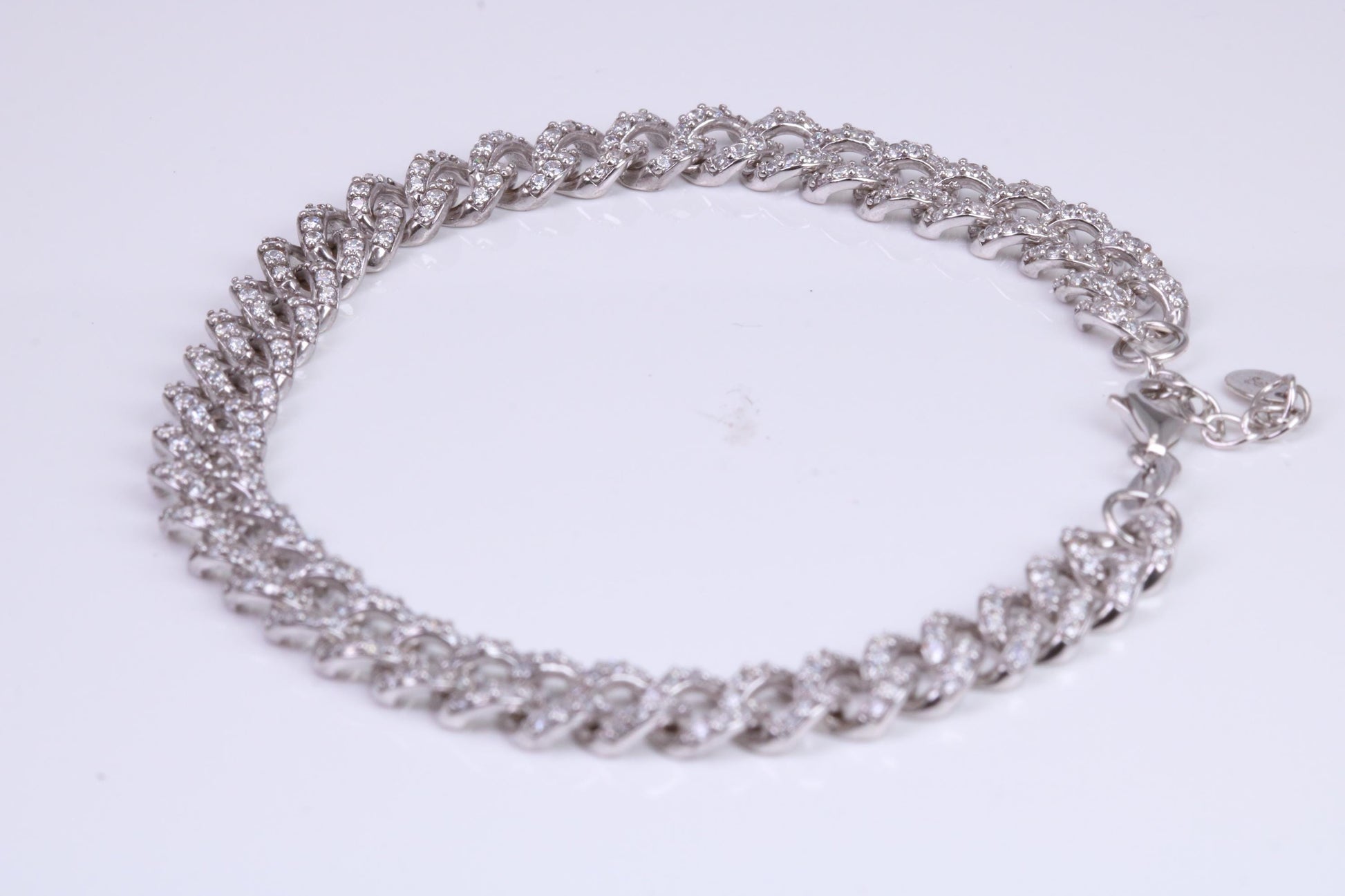 C Z set Curb Link Bracelet, AAA Graded C Z, Made from solid Sterling Silver, 8.50 Inches Long and 9 mm Wide, Length Adjustable