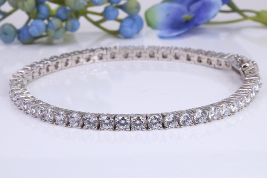 Tennis Bracelet, made from solid Sterling Silver and set with top graded Diamond White C Z, 8.50 inches Long