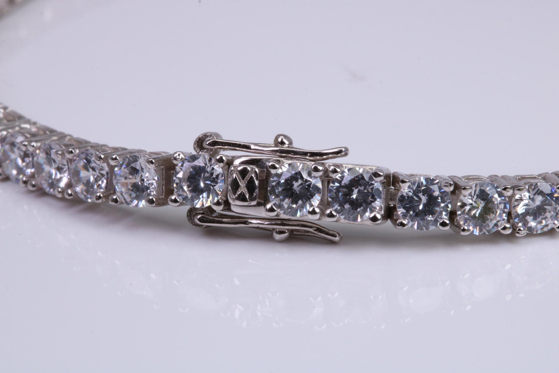 Tennis Bracelet, made from solid Sterling Silver and set with top graded Diamond White C Z, 8.50 inches Long