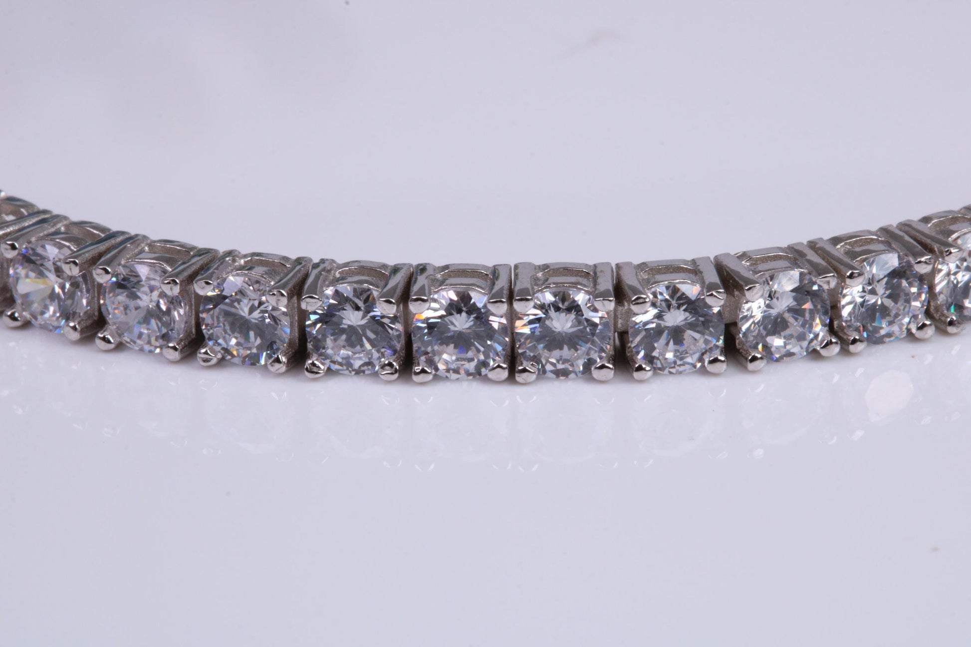 Tennis Bracelet, made from solid Sterling Silver and set with top graded Diamond White C Z, 8.50 inches Long