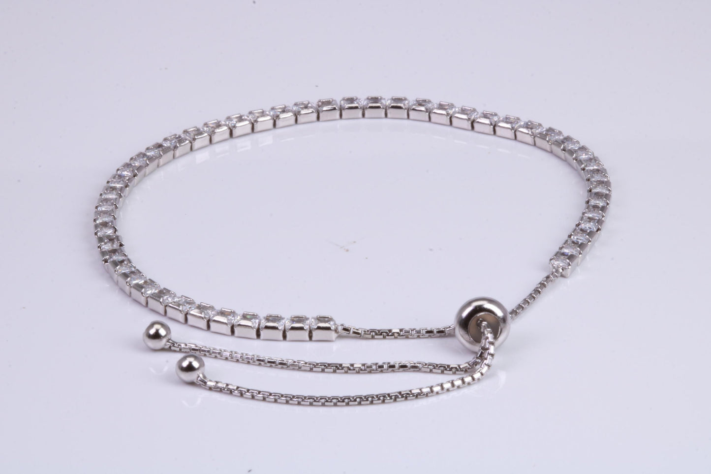 Line Tennis Bracelet, Square Cubic Zirconia set and made from solid Sterling Silver, Length adjustable