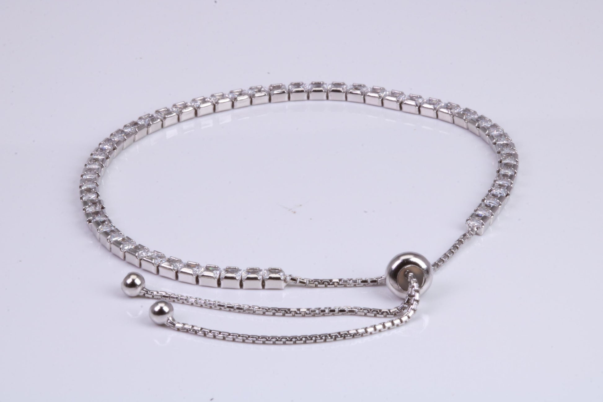 Line Tennis Bracelet, Square Cubic Zirconia set and made from solid Sterling Silver, Length adjustable