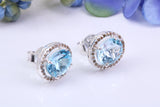 Real Blue Topaz and Diamonds set Oval Cluster Studs in Silver