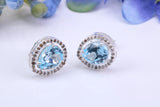 Real Blue Topaz and Diamonds set Teardrop Cluster Studs in Silver