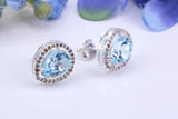 Real Blue Topaz and Diamonds set Teardrop Cluster Studs in Silver