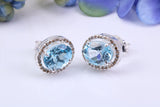 Real Blue Topaz and Diamonds set Oval Cluster Studs in Silver