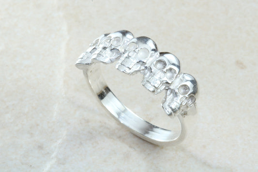 Skull ring,solid silver, 5 skulls around ring, perfect for ladies and gents. Available in Silver, Yellow gold, White gold and Platinum