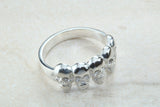 Skull ring,solid silver, 5 skulls around ring, perfect for ladies and gents. Available in Silver, Yellow gold, White gold and Platinum