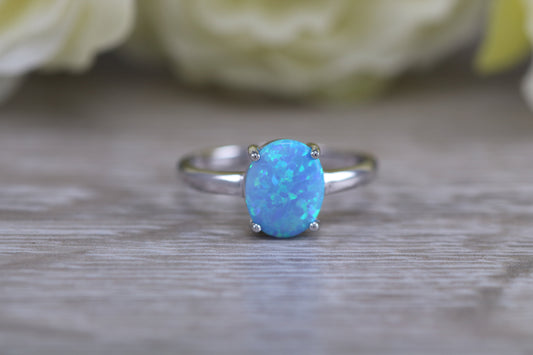 Very sparkly and fiery Opal solitaire, solid sterling silver ring further rhodium plated for that platinum look