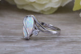 Very sparkly and fiery Opal and cubic zirconia set dress ring, solid sterling silver ring further rhodium plated for that platinum look