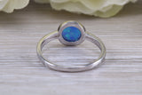 Fiery Blue Opal solitaire ring, solid sterling silver ring further rhodium plated for that platinum look