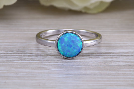 Fiery Blue Opal solitaire ring, solid sterling silver ring further rhodium plated for that platinum look